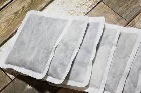 写真、使い捨てカイロが６個並べてある